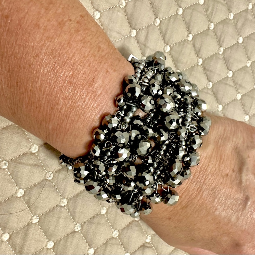 Stretch multi strand silver beaded bracelet